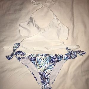 White wrap bikini top and floral bottoms